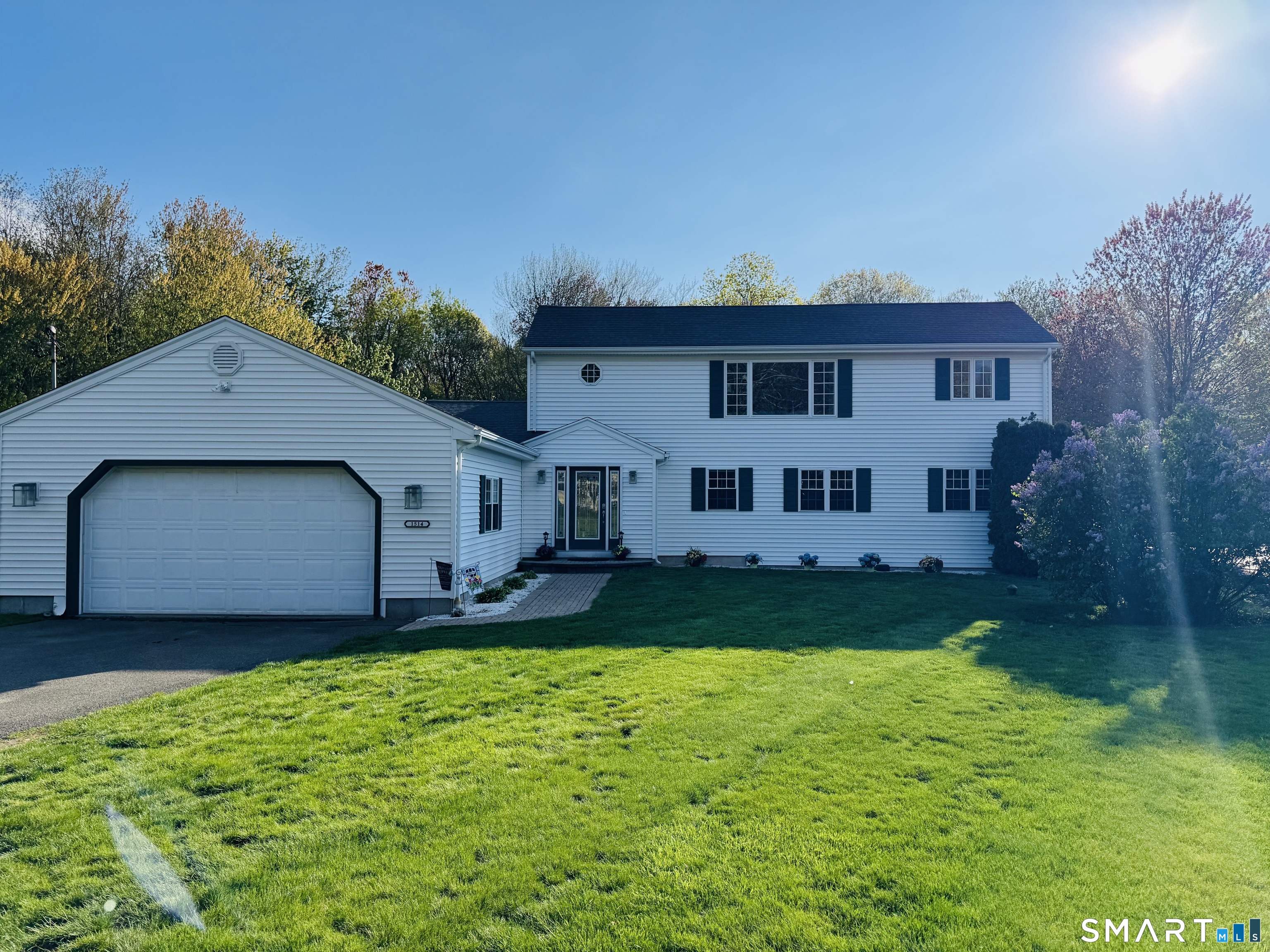 1514 Woodtick Road Wolcott, CT 06716 - Photo 1 of 23 a house view with a garden space