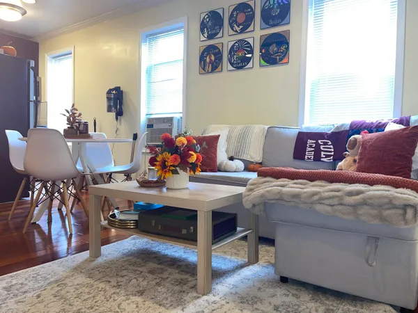 a living room with a couch and a table