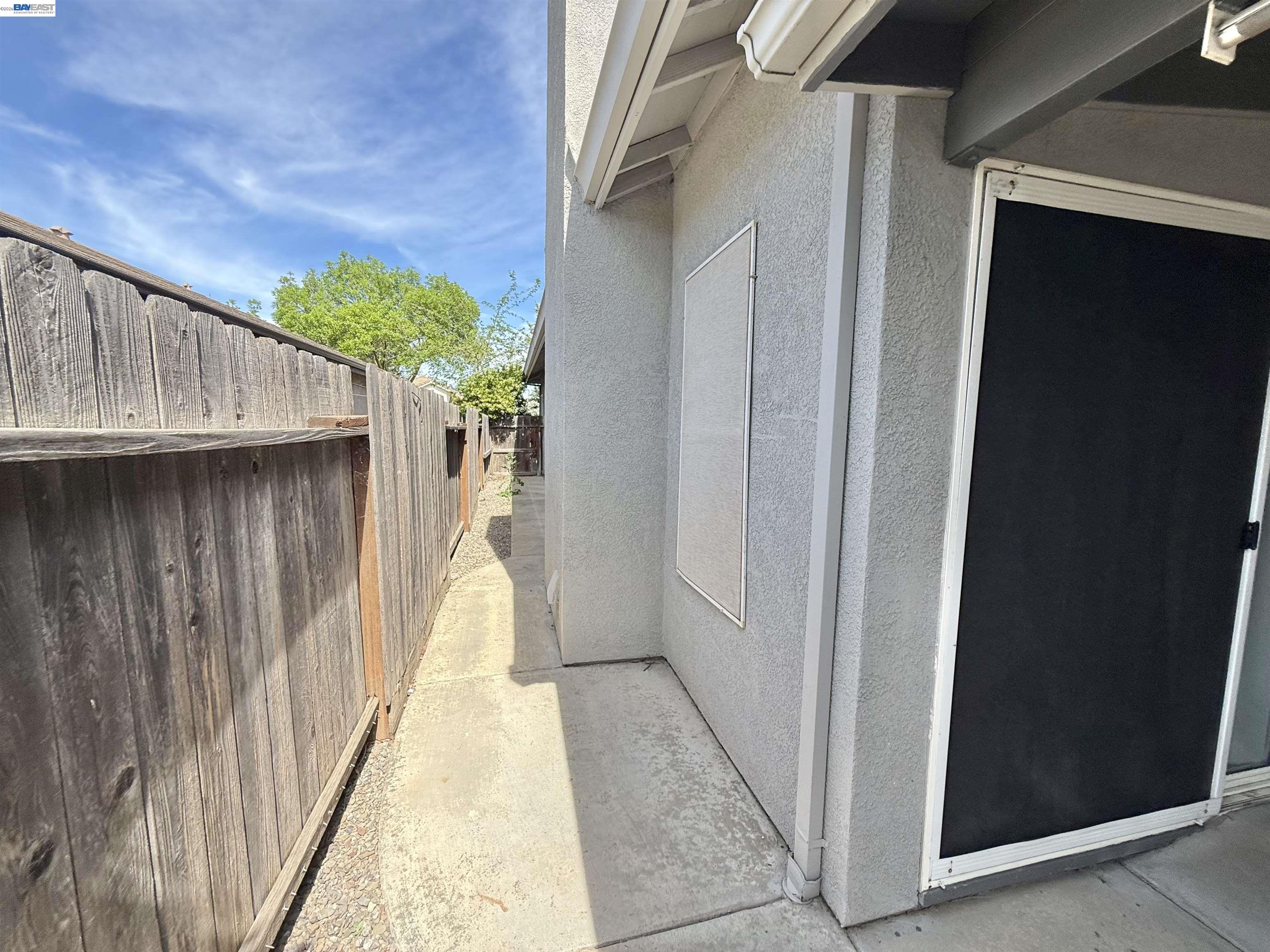 2408 Mountain Pride Court Modesto, CA 95355 - Photo 20 of 25 a view of a wooden door