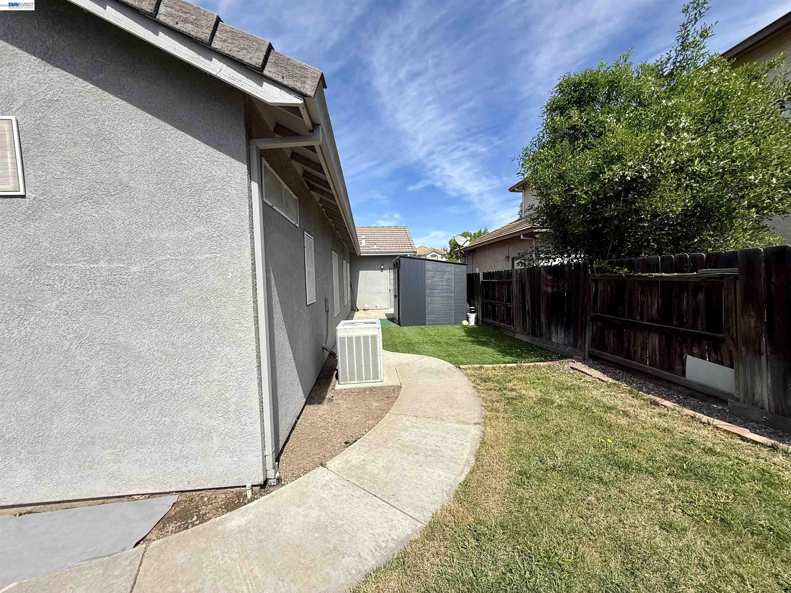 2408 Mountain Pride Court Modesto, CA 95355 - Photo 23 of 25 a view of backyard of house