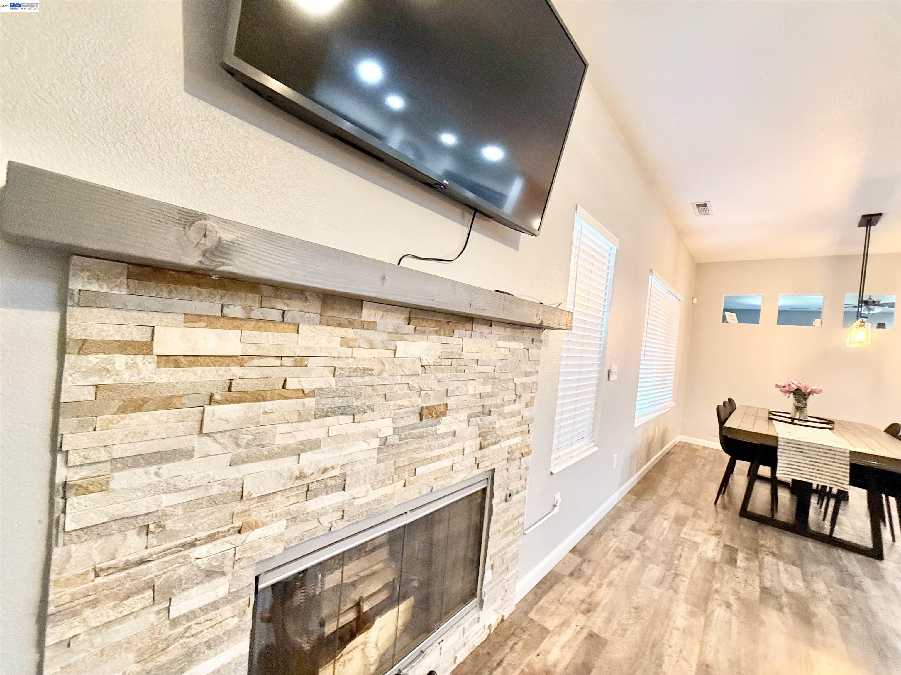 2408 Mountain Pride Court Modesto, CA 95355 - Photo 6 of 25 a bathroom with a sink and a large mirror