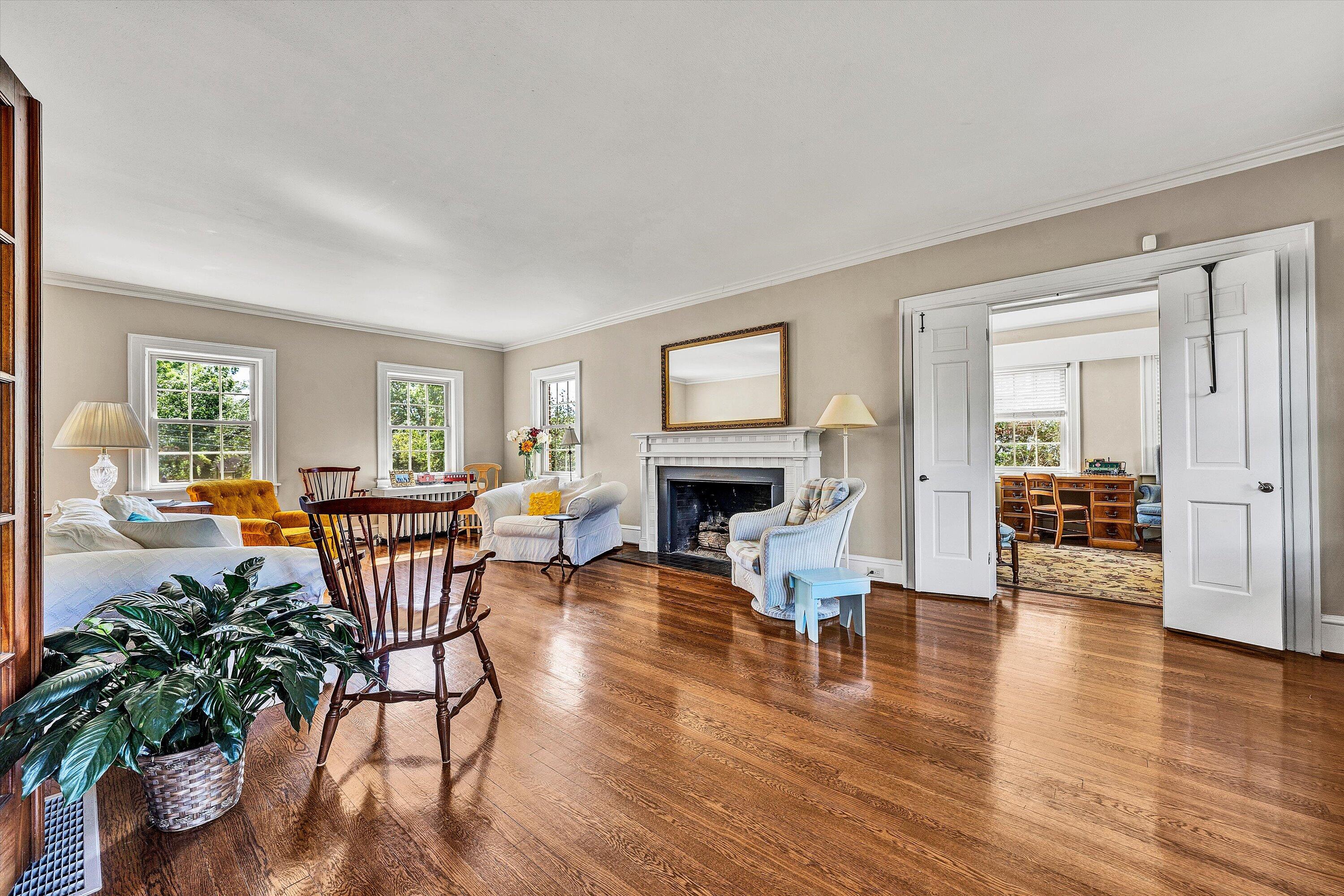 1930 Grandin Road Southwest Roanoke, VA 24015 - Photo 14 of 100 a living room with furniture a fireplace and wooden floor