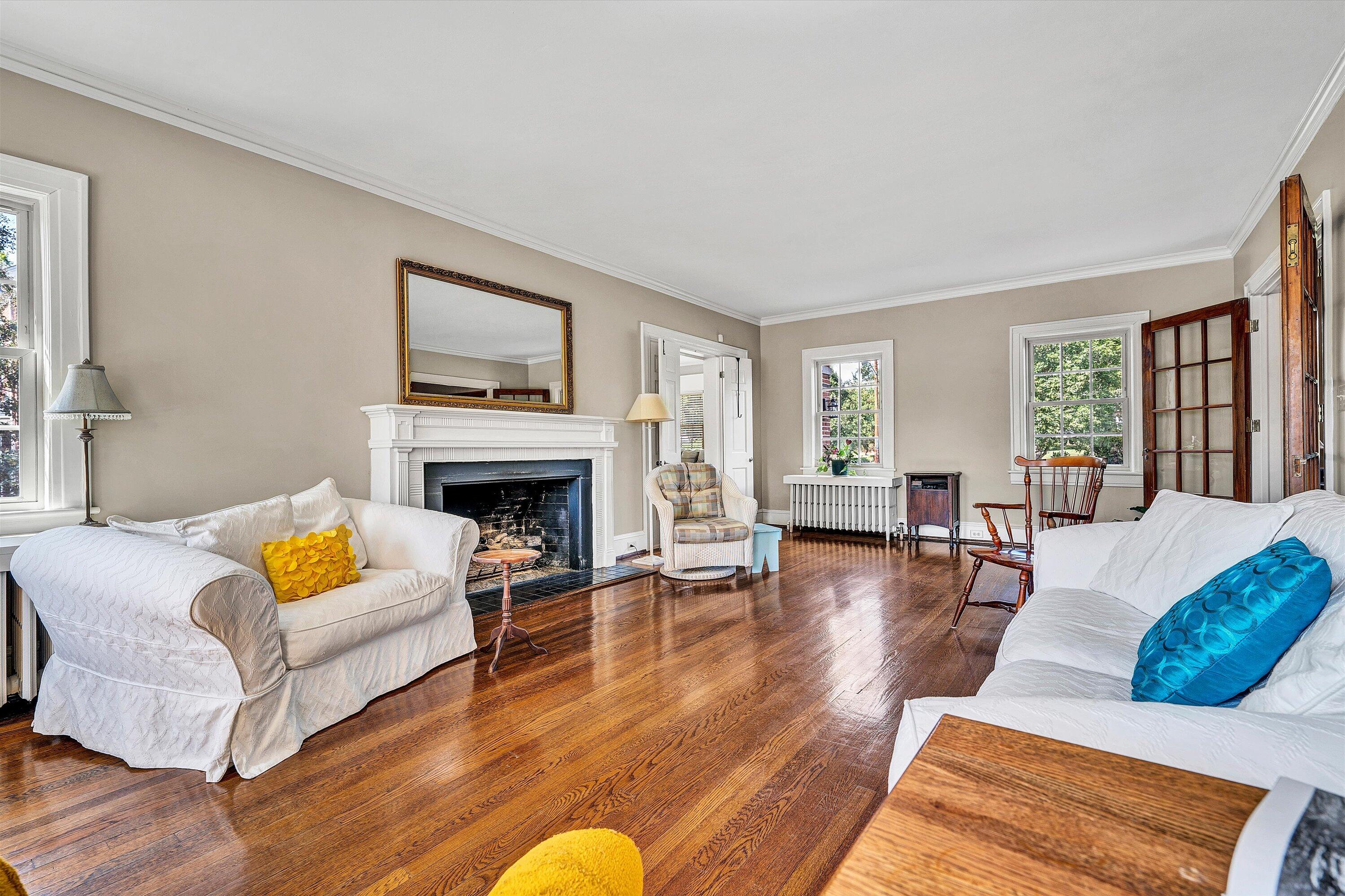1930 Grandin Road Southwest Roanoke, VA 24015 - Photo 17 of 100 a living room with furniture wooden floor and a fireplace