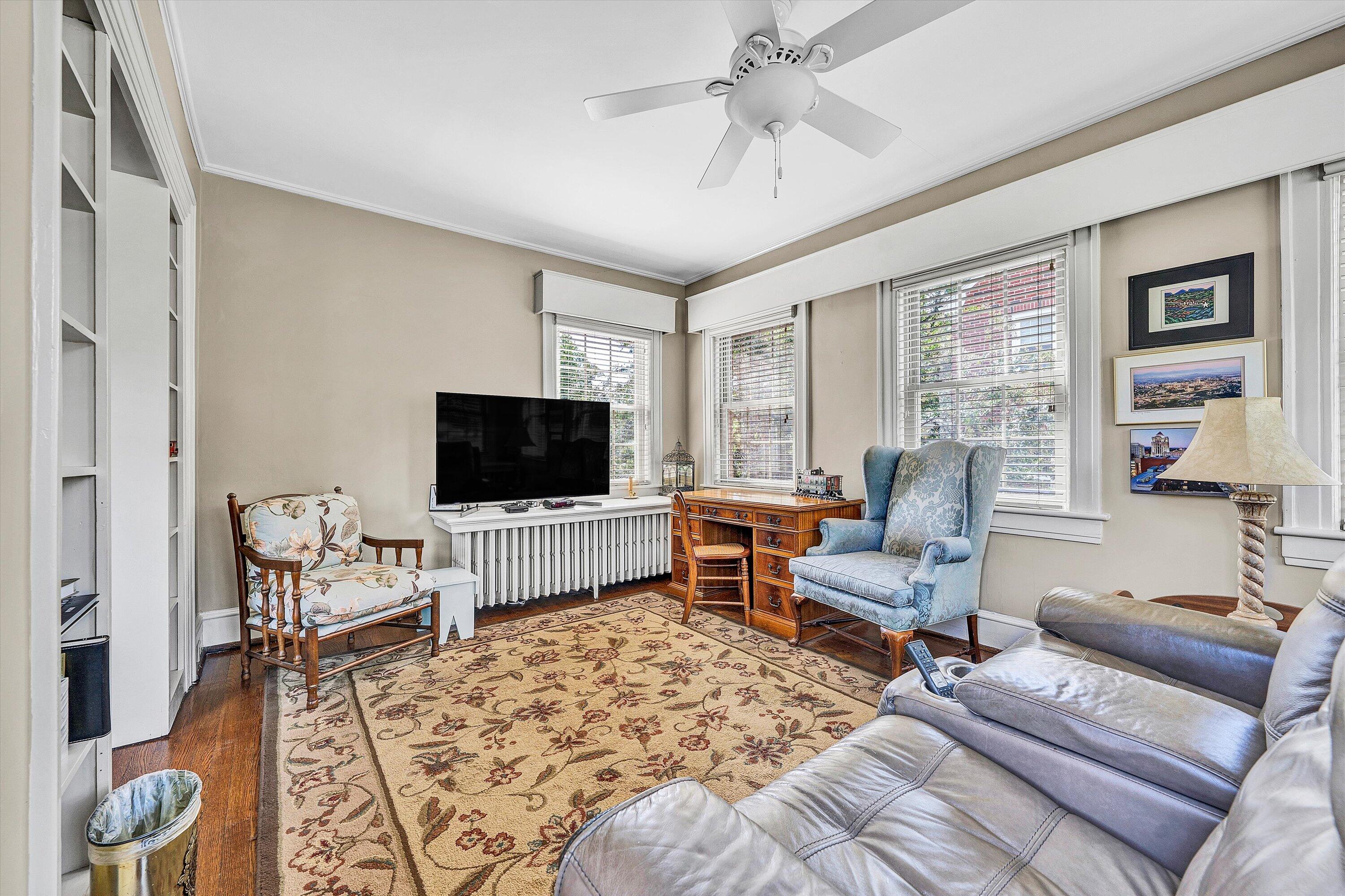1930 Grandin Road Southwest Roanoke, VA 24015 - Photo 19 of 100 a living room with furniture and a flat screen tv
