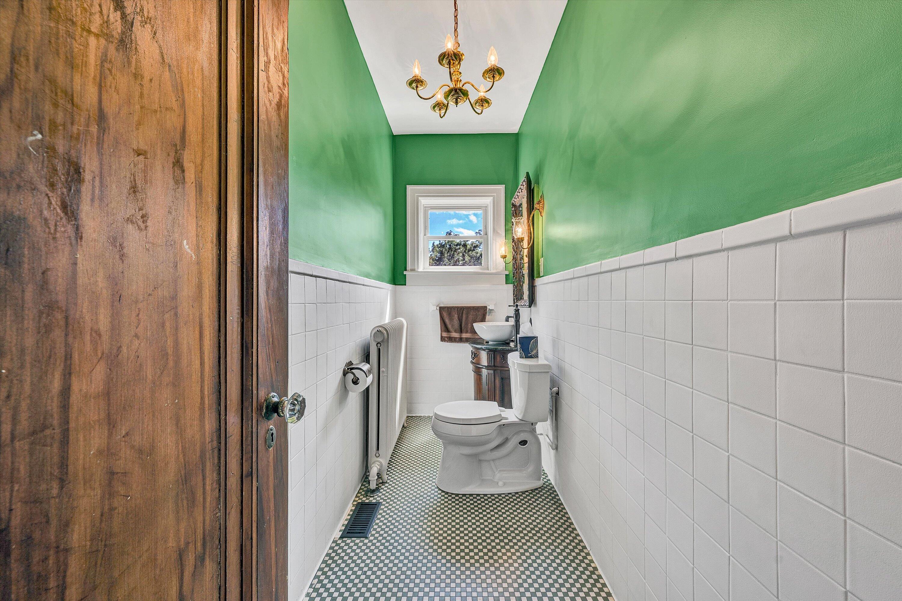 1930 Grandin Road Southwest Roanoke, VA 24015 - Photo 38 of 100 a bathroom with a toilet and a mirror