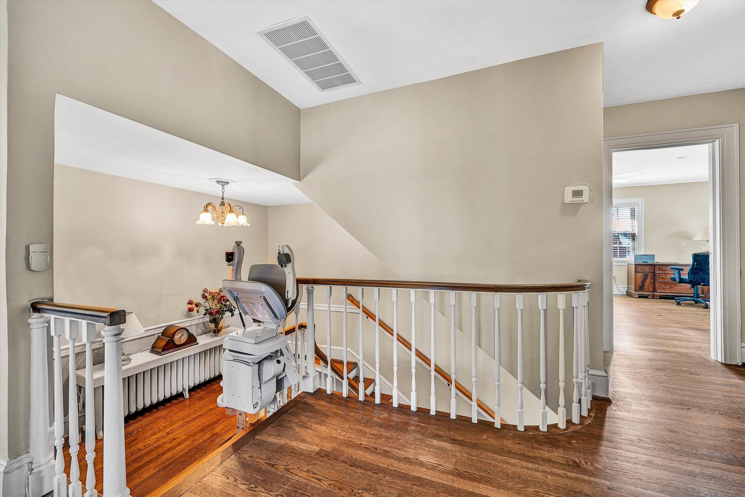 1930 Grandin Road Southwest Roanoke, VA 24015 - Photo 41 of 100 a view of a hallway with dining room and wooden floor