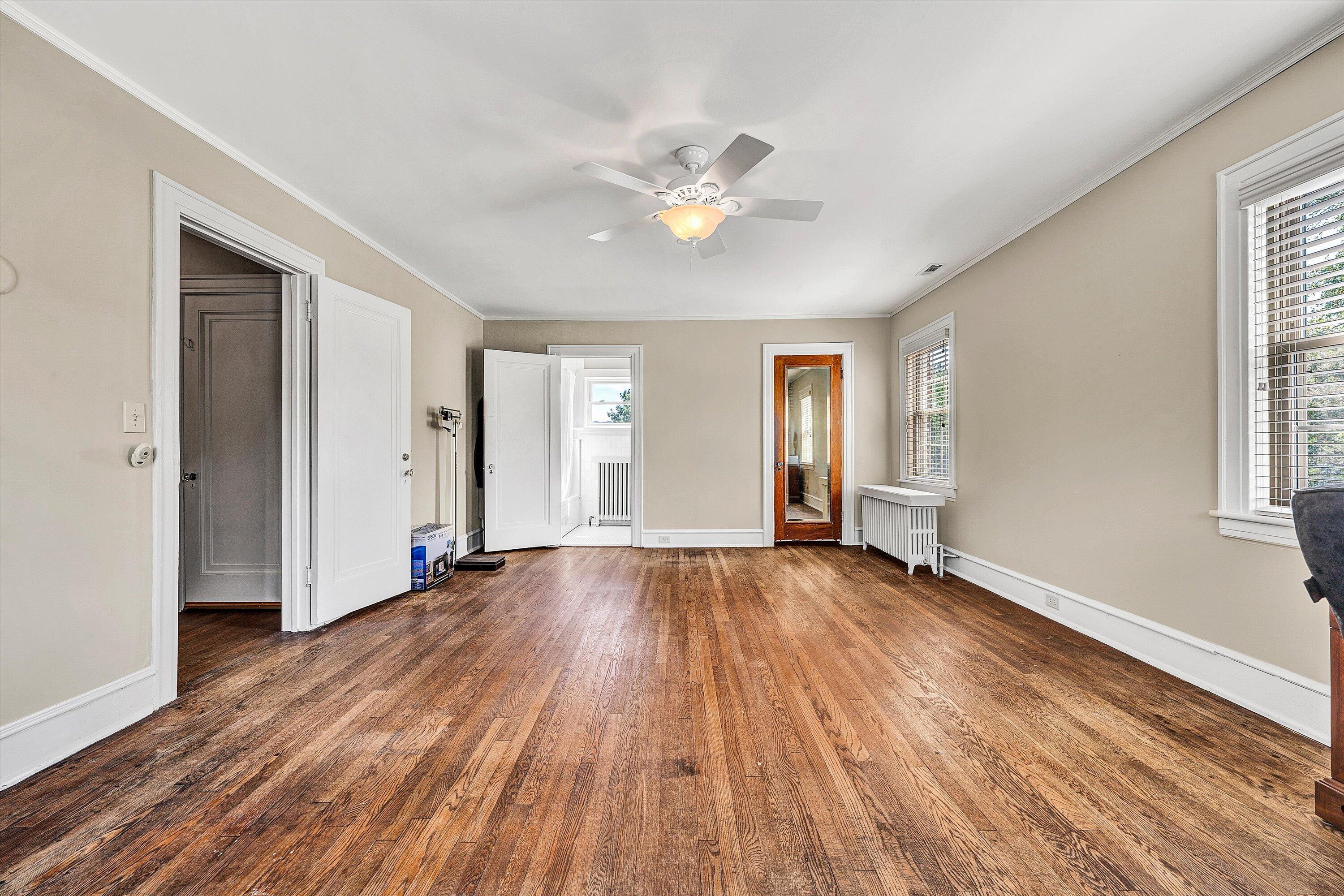 1930 Grandin Road Southwest Roanoke, VA 24015 - Photo 43 of 100 an empty room with wooden floor and windows