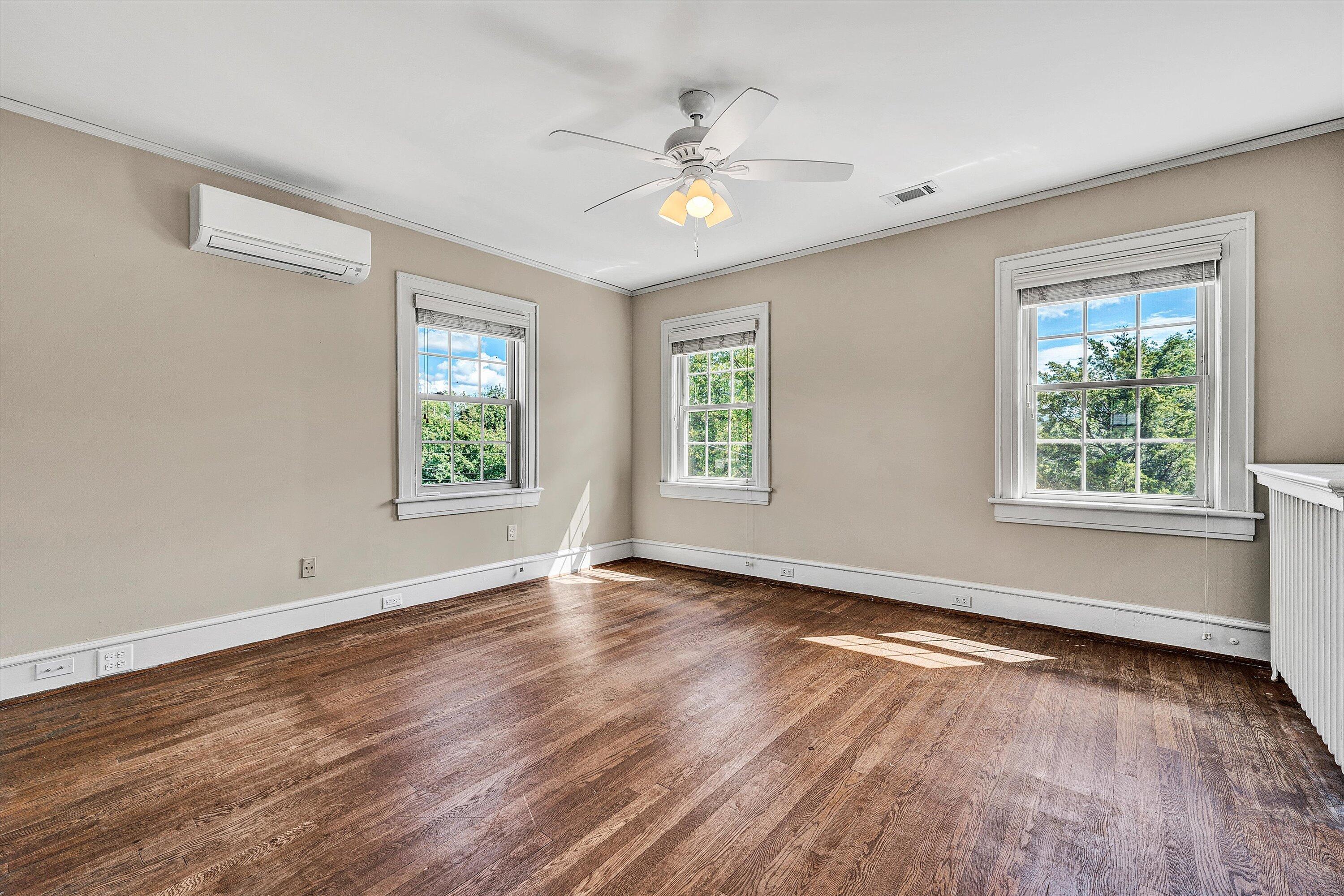1930 Grandin Road Southwest Roanoke, VA 24015 - Photo 46 of 100 a view of an empty room with wooden floor and a window