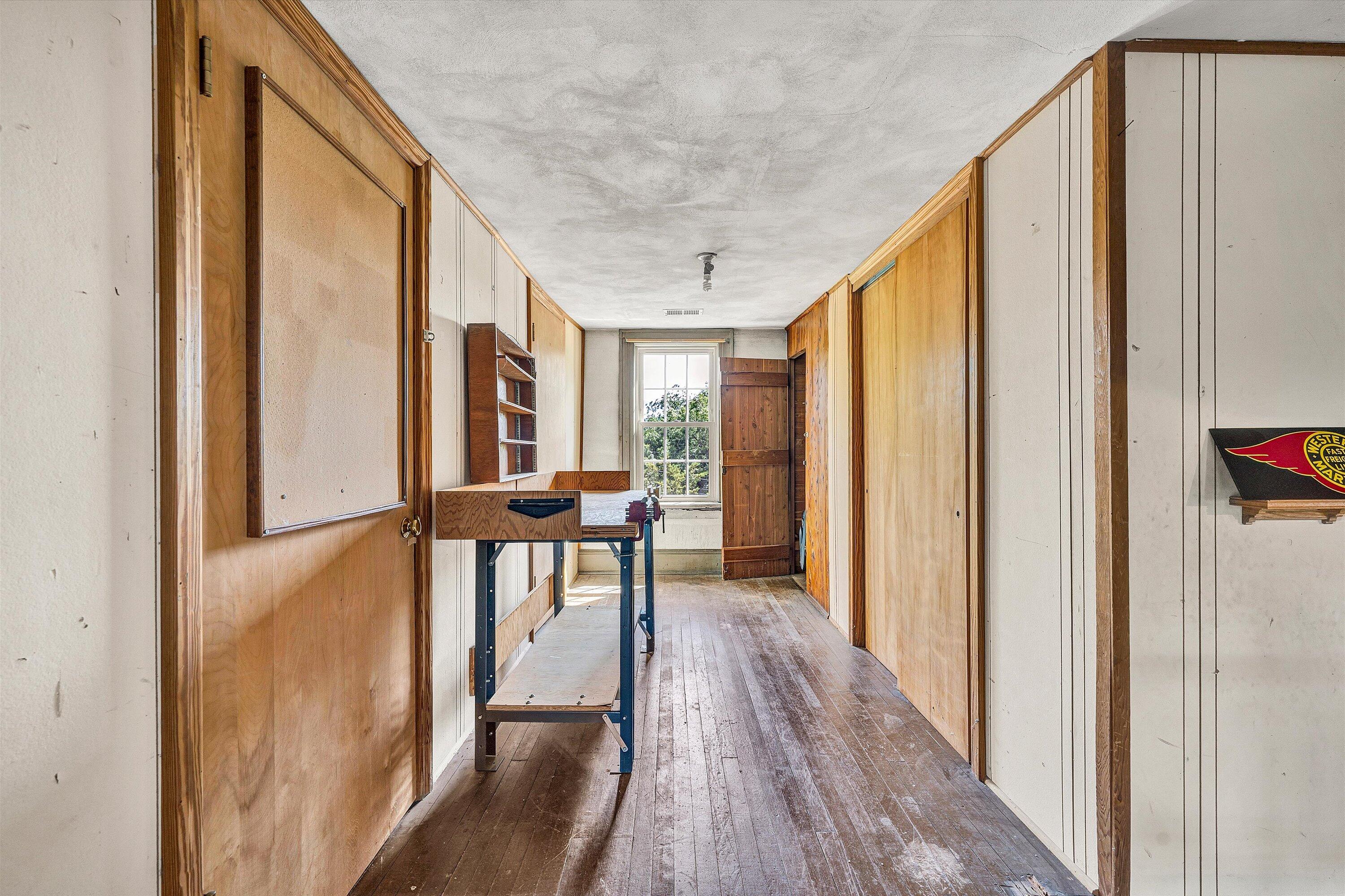 1930 Grandin Road Southwest Roanoke, VA 24015 - Photo 60 of 100 a view of a hallway with wooden floor and staircase