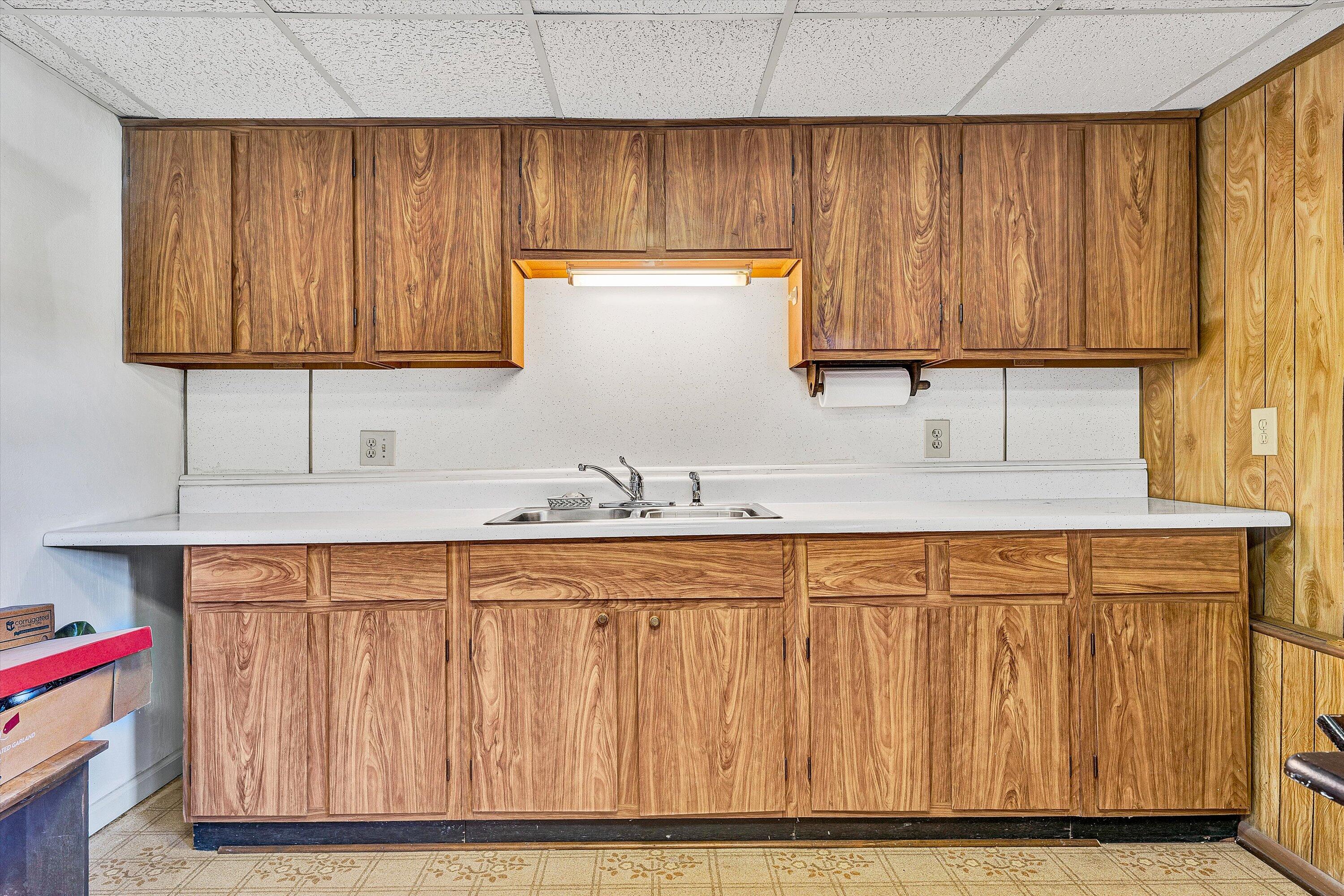 1930 Grandin Road Southwest Roanoke, VA 24015 - Photo 64 of 100 a kitchen with a sink cabinets and wooden floor