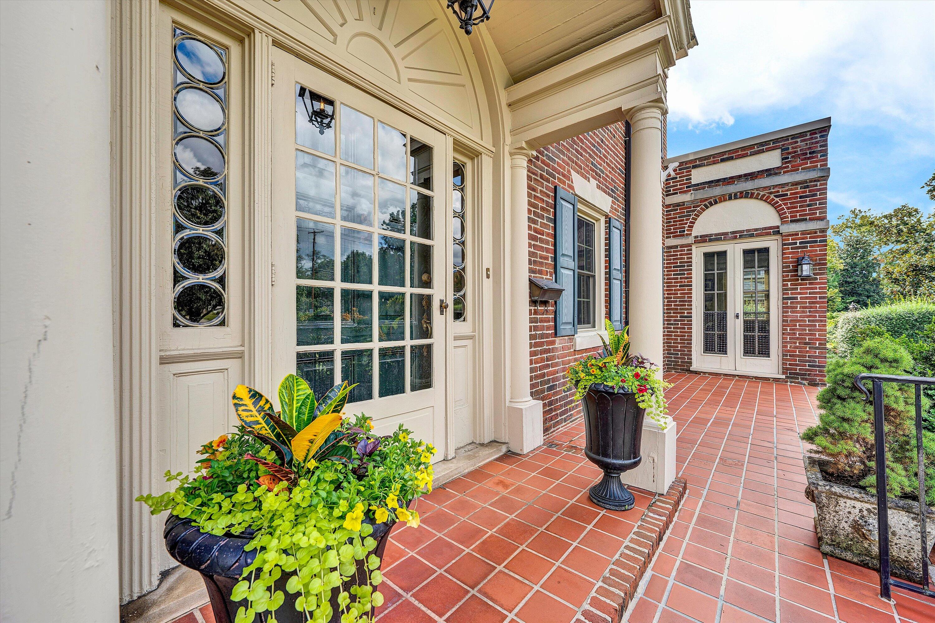 1930 Grandin Road Southwest Roanoke, VA 24015 - Photo 7 of 100 a front view of a house with a garden