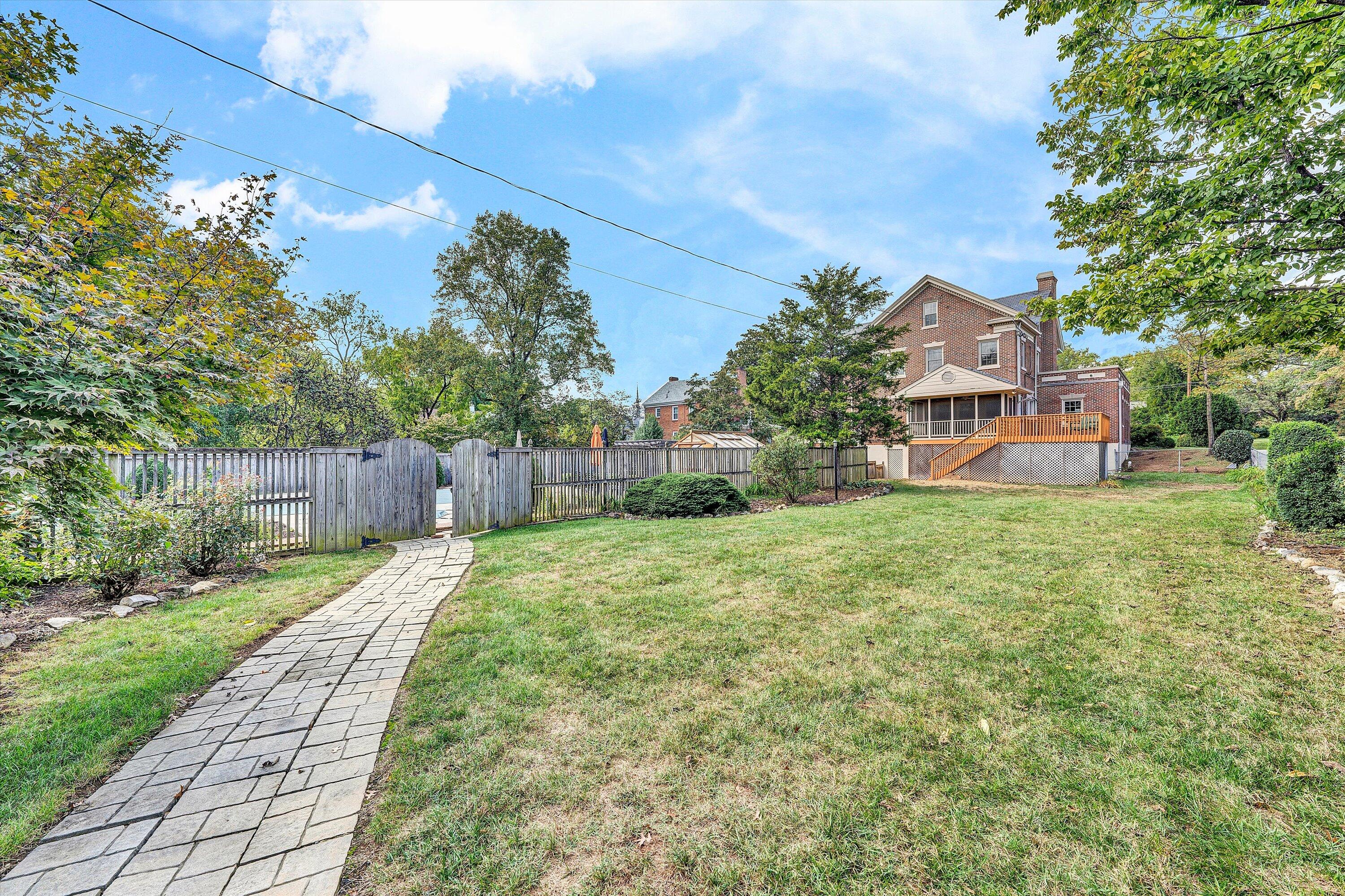 1930 Grandin Road Southwest Roanoke, VA 24015 - Photo 73 of 100 a view of a yard with plants and a large tree