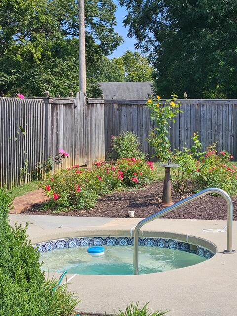 1930 Grandin Road Southwest Roanoke, VA 24015 - Photo 86 of 100 a garden with flowers and wooden fence