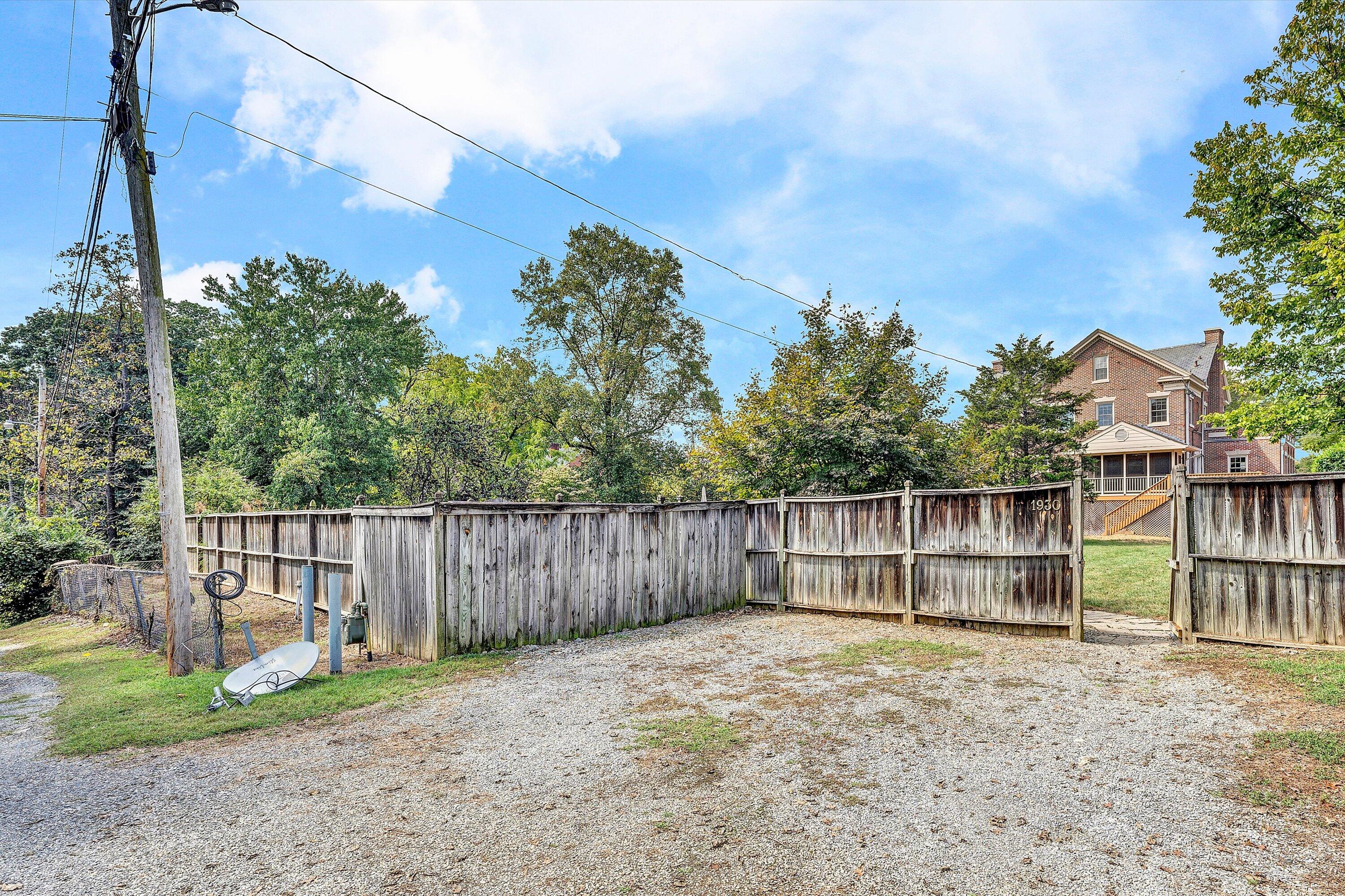 1930 Grandin Road Southwest Roanoke, VA 24015 - Photo 96 of 100 a backyard of a house with wooden floor and fence