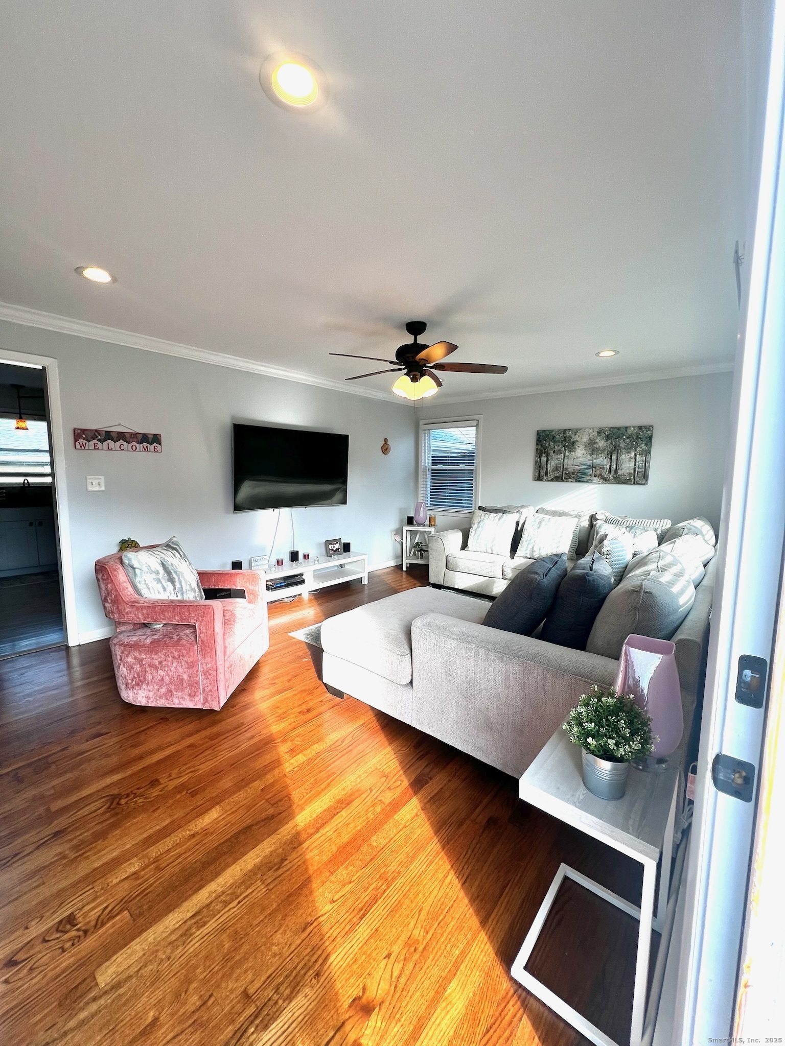 20 Glenfield Avenue Stratford, CT 06614 - Photo 4 of 12 a living room with furniture and a flat screen tv