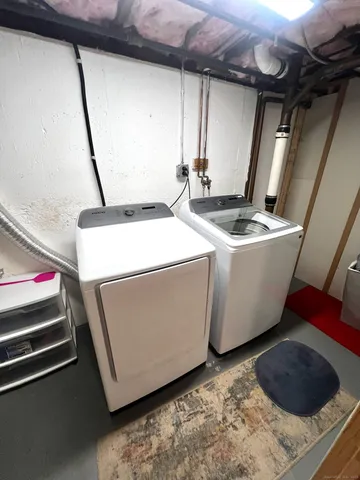 a utility room with dryer and washer