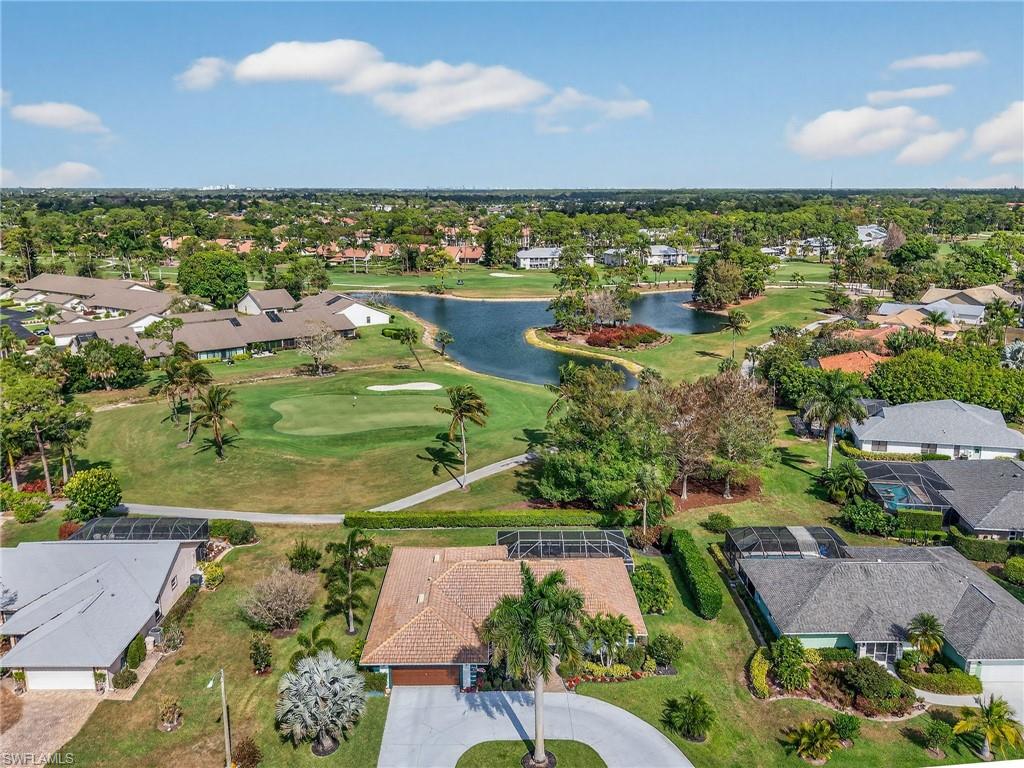 681 St Andrews Boulevard Naples, FL 34113 - Photo 1 of 20 an aerial view of residential building and lake