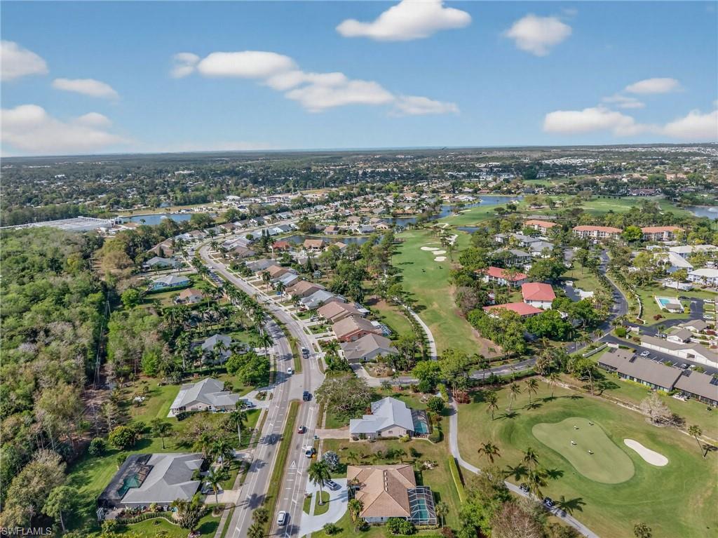 681 St Andrews Boulevard Naples, FL 34113 - Photo 19 of 20 an aerial view of a city