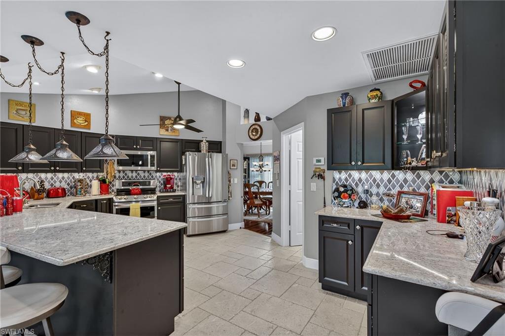 681 St Andrews Boulevard Naples, FL 34113 - Photo 4 of 20 a view of storage and utility room