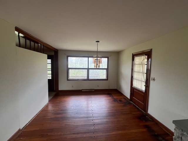 2281 Union Road Middletown, OH 45044 - Photo 6 of 20 This versatile space features rich hardwood flooring, a charming chandelier, and ample natural light.