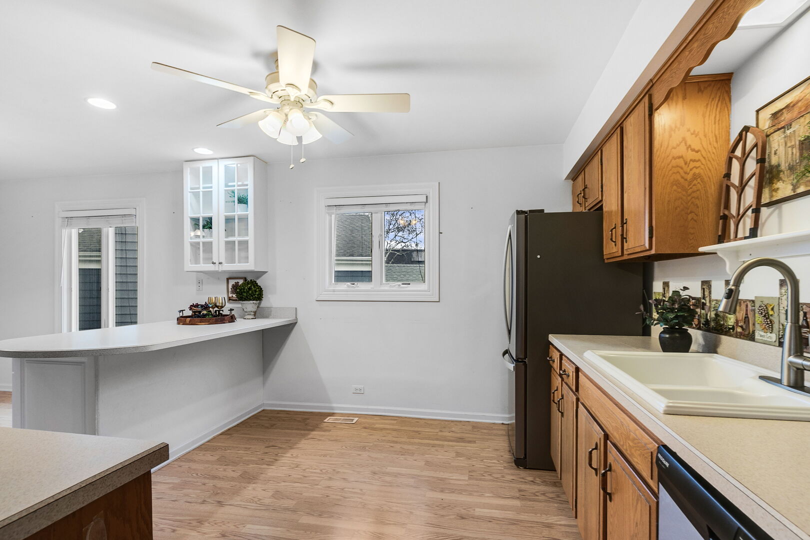 5080 Prairie Oak Road Gurnee, IL 60031 - Photo 2 of 20 a kitchen with stainless steel appliances a sink stove and refrigerator