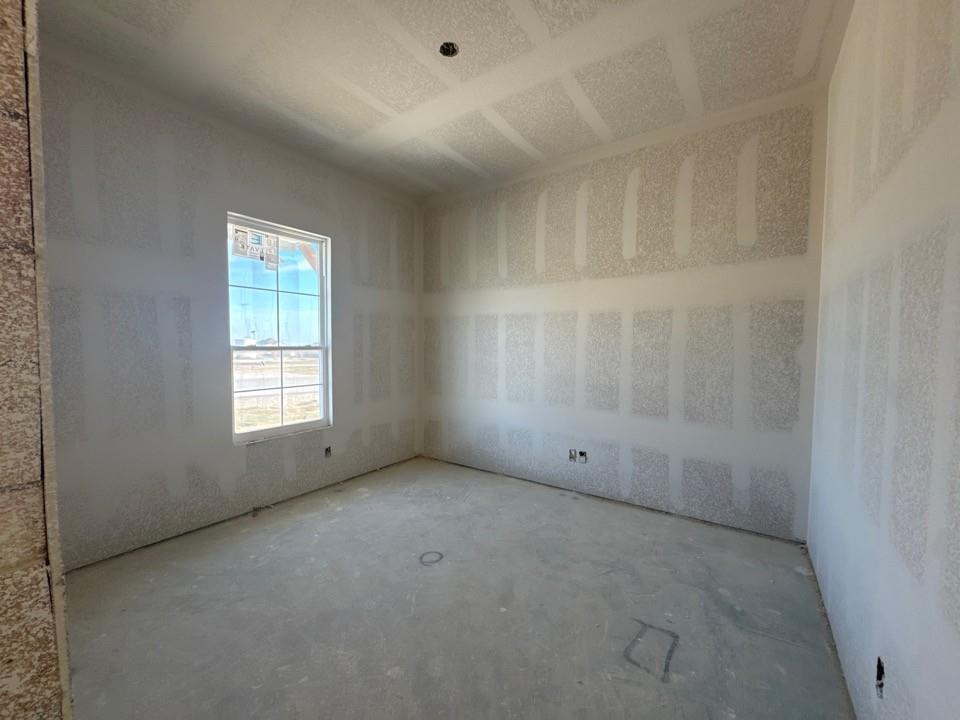 197 Mdw Vista Drive Rhome, TX 76078 - Photo 4 of 13 a view of an empty room with a window