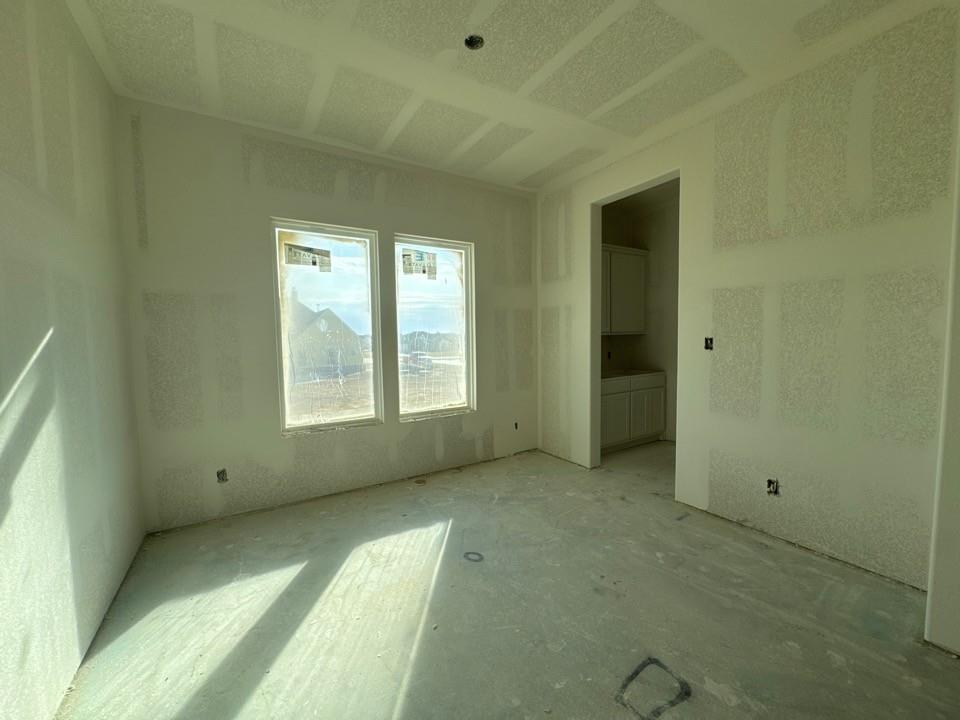 197 Mdw Vista Drive Rhome, TX 76078 - Photo 5 of 13 a view of an empty room with a window