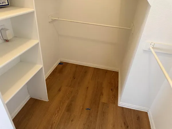 a bathroom with a sink and shower