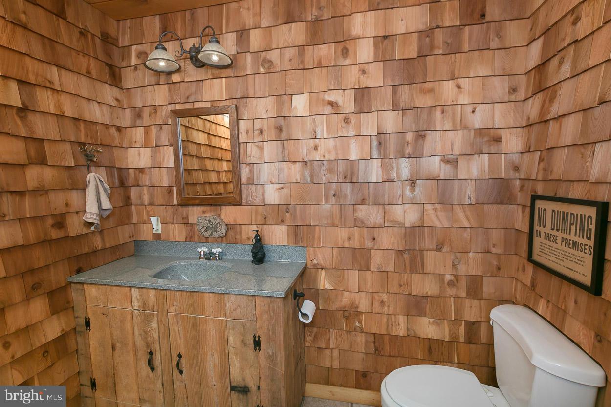 2525 Urey Road White Hall, MD 21161 - Photo 20 of 30 Bath in mancave with cedar shake walls