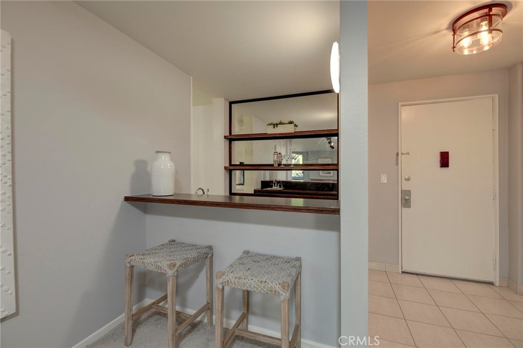 6315 Green Valley Circle, Unit 200 Culver City, CA 90230 - Photo 12 of 40 a kitchen with a sink cabinets and appliances