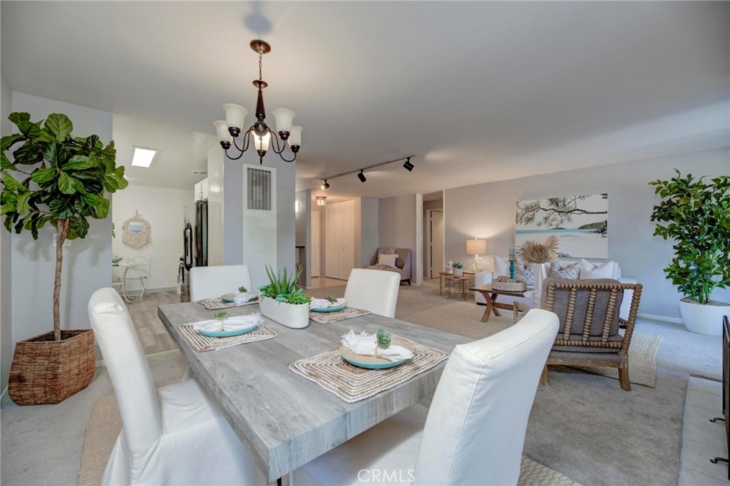 6315 Green Valley Circle, Unit 200 Culver City, CA 90230 - Photo 2 of 40 a view of a dining room with furniture window and wooden floor