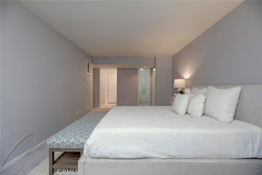 6315 Green Valley Circle, Unit 200 Culver City, CA 90230 - Photo 27 of 40 a bedroom with a bed and a window