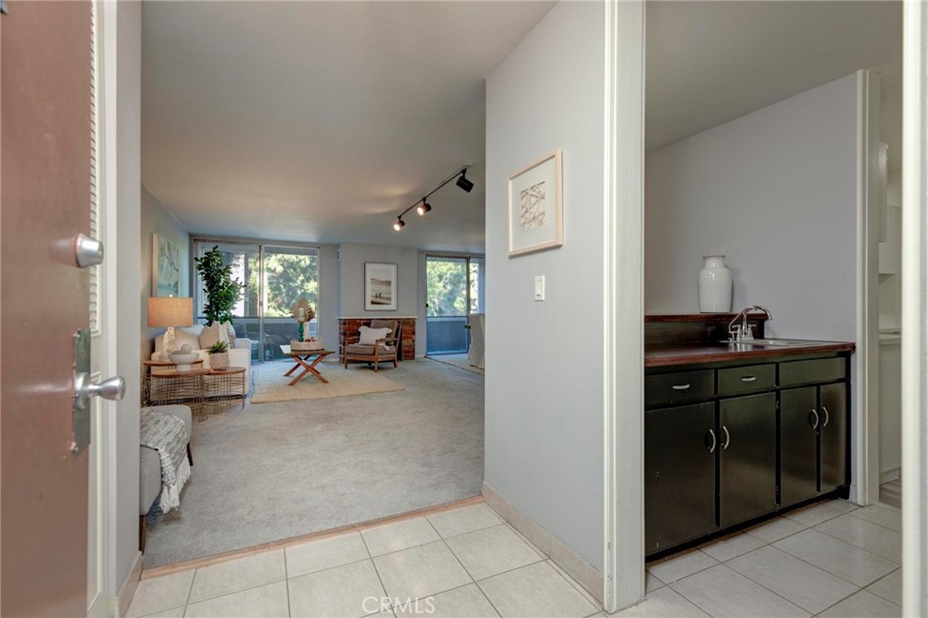 6315 Green Valley Circle, Unit 200 Culver City, CA 90230 - Photo 3 of 40 a living room with furniture and a table