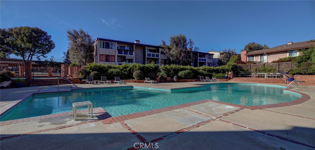 6315 Green Valley Circle, Unit 200 Culver City, CA 90230 - Photo 34 of 40 front view of a house with swimming pool garden and patio