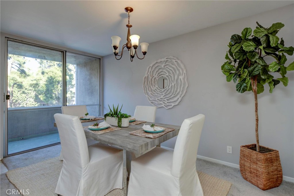6315 Green Valley Circle, Unit 200 Culver City, CA 90230 - Photo 10 of 40 a view of a dining room with furniture window and outside view