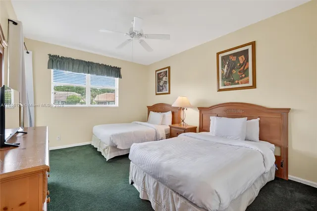 a view of a room with a large window