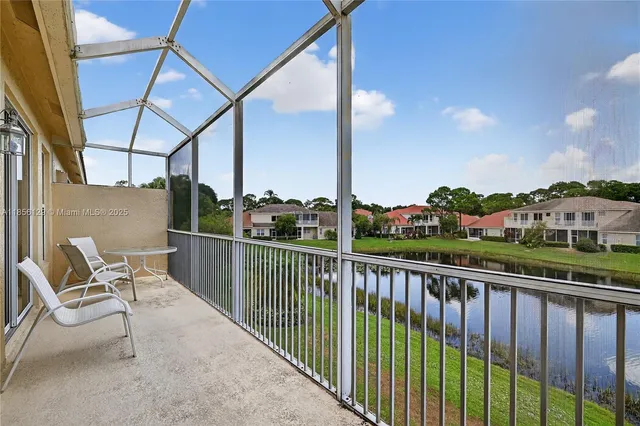 a view of roof deck with furniture