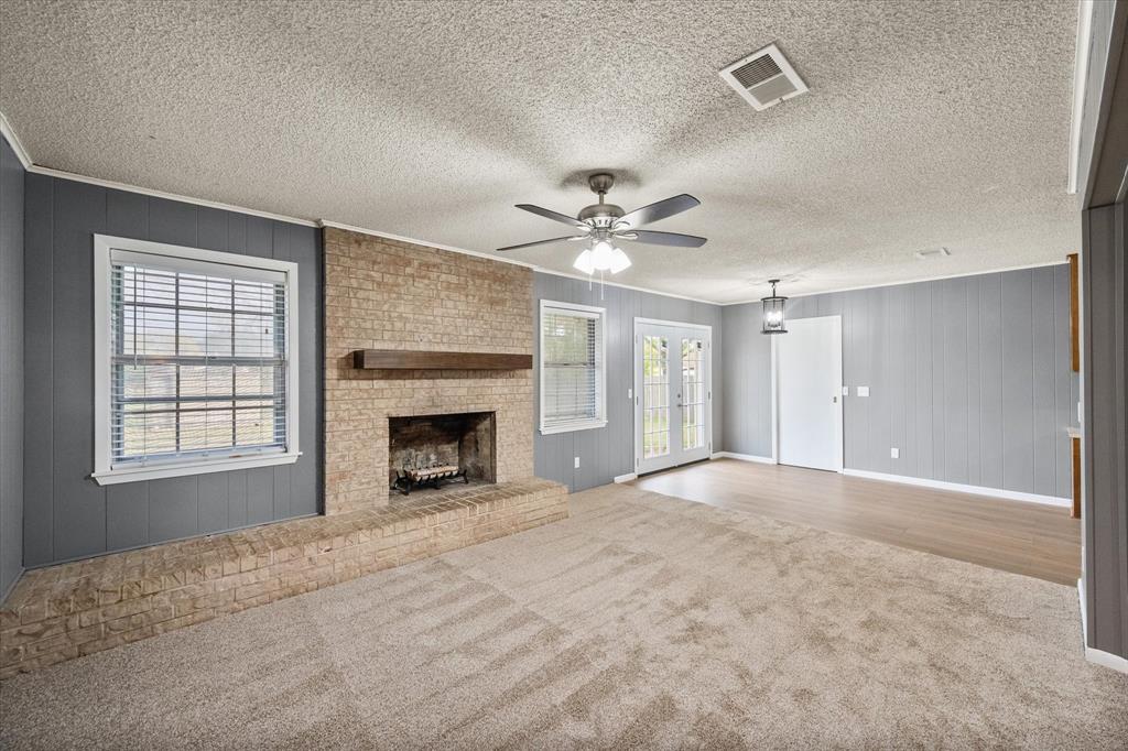 536 Robindale Lane Fairfield, TX 75840 - Photo 9 of 38 an empty room with fan and windows