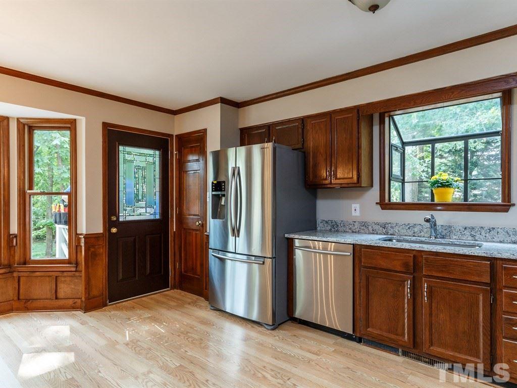 8501 Council Court Raleigh, NC 27615 - Photo 4 of 19 a kitchen with stainless steel appliances granite countertop a refrigerator and a sink