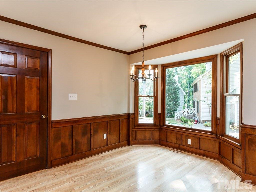 8501 Council Court Raleigh, NC 27615 - Photo 5 of 19 a view of an empty room with wooden floor and a window