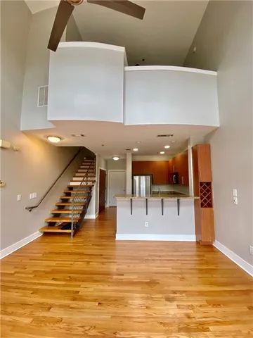 a hallway with table and chairs