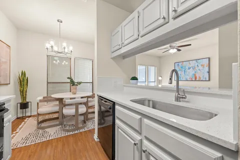 a view of living room with granite countertop furniture and fireplace