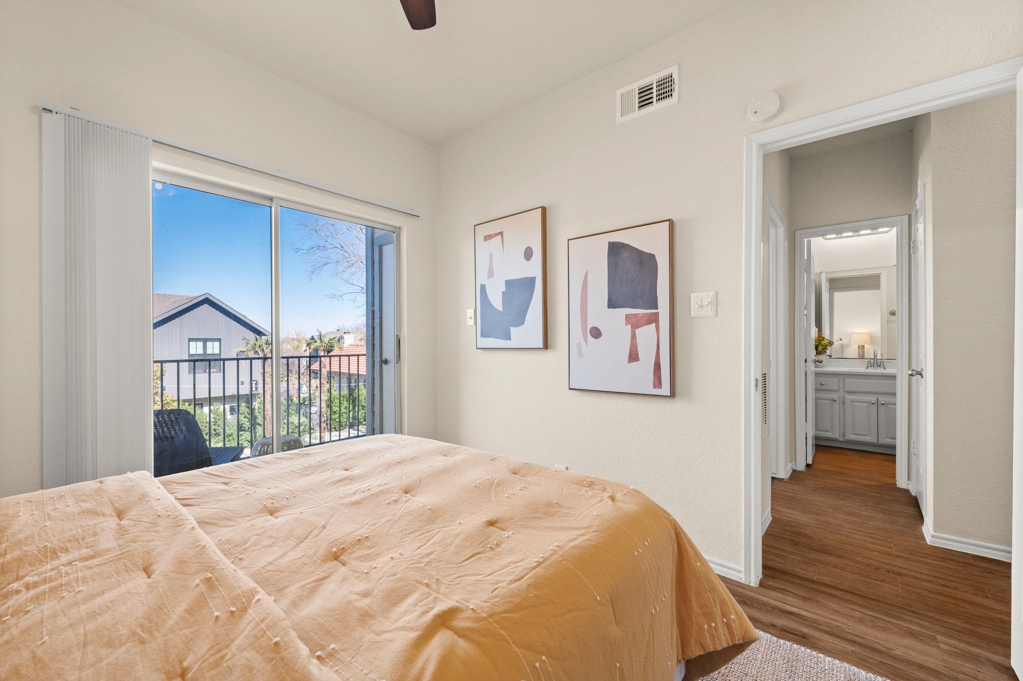 914 West 26th Street, Unit 202 Austin, TX 78705 - Photo 18 of 34 a bedroom with a bed and a window