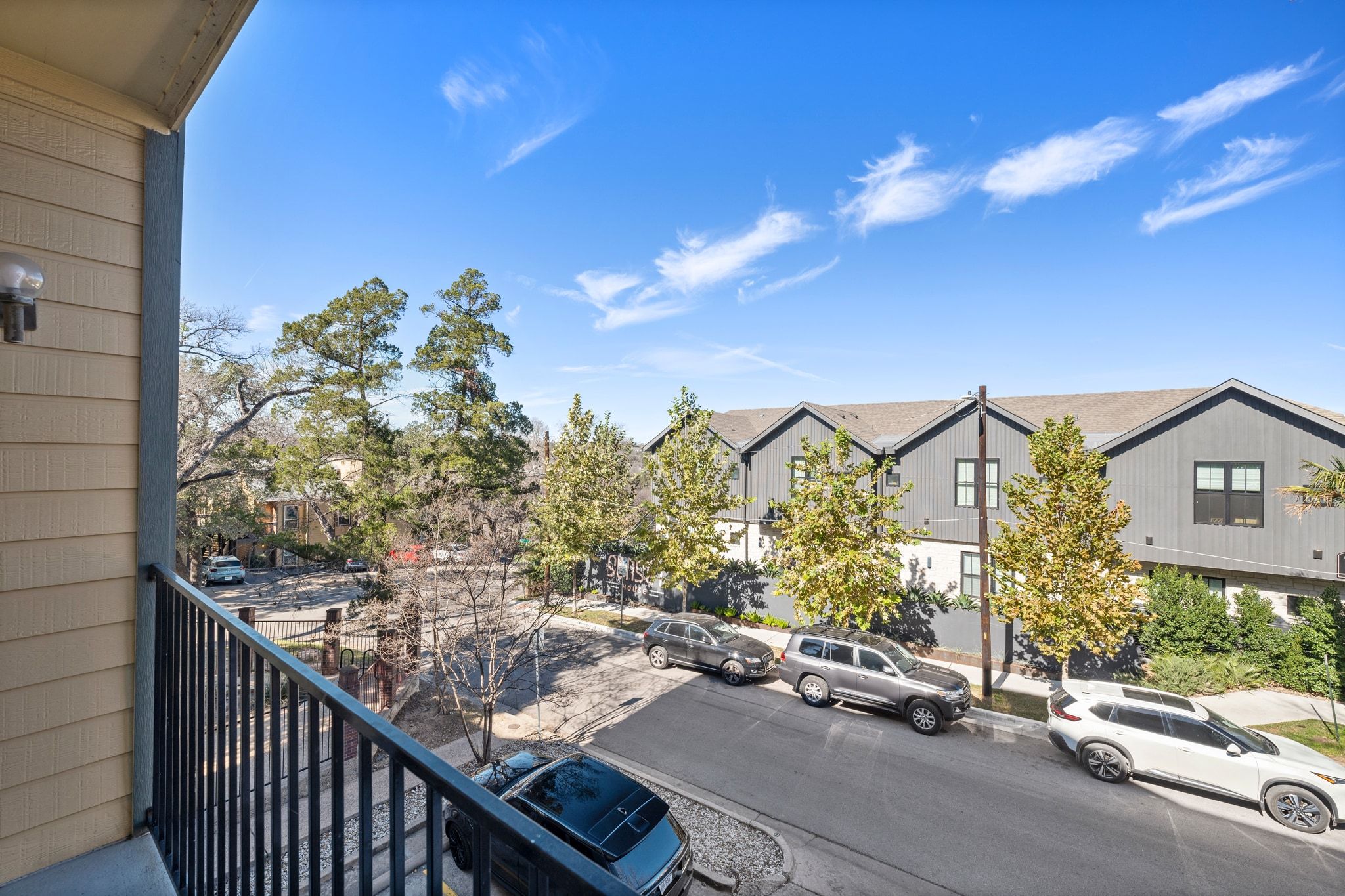 914 West 26th Street, Unit 202 Austin, TX 78705 - Photo 20 of 34 a view of a city from a balcony