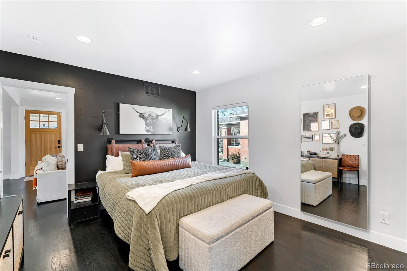 4270 Irving Street Denver, CO 80211 - Photo 18 of 34 a bedroom with a large bed and a window