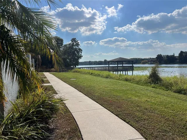 a view of a lake with a yard