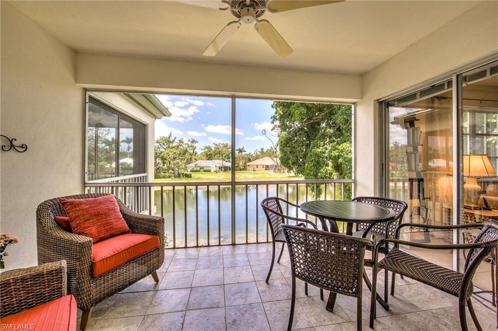 113 Bobolink Way, Unit 113B Naples, FL 34105 - Photo 13 of 15 a dining room with furniture and large windows