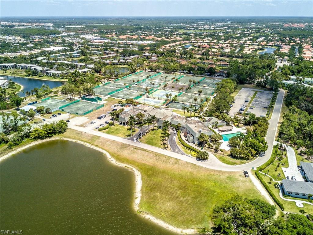 113 Bobolink Way, Unit 113B Naples, FL 34105 - Photo 15 of 15 a view of a lake