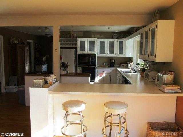 4405 Old Gee Road Hopewell, VA 23860 - Photo 4 of 12 Kitchen - Breakfast Nook by Day, Entertainment Are
