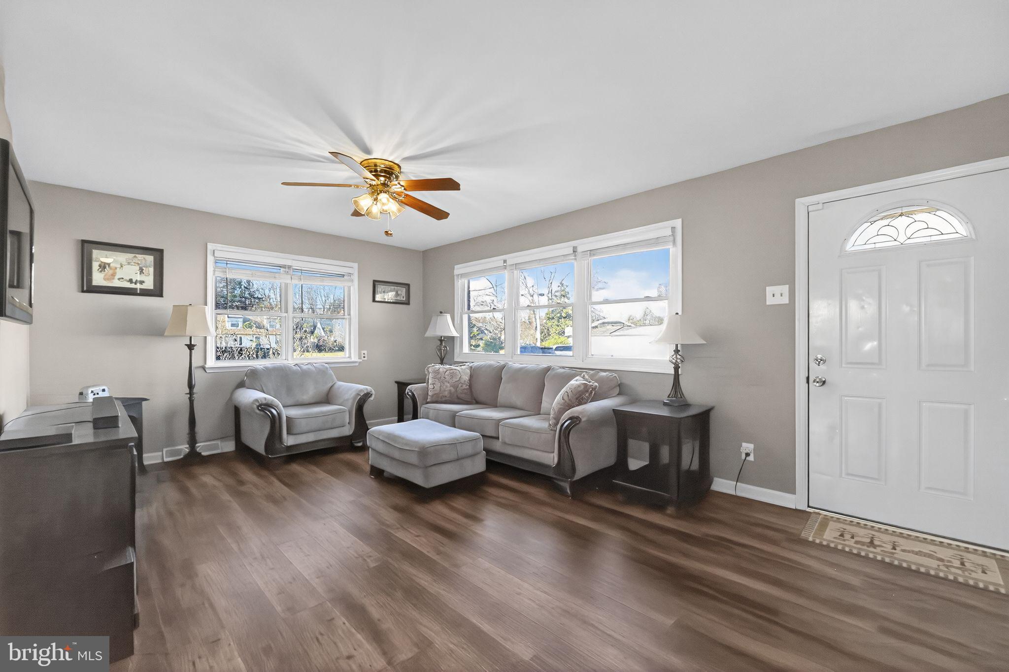 15 Winslow Road Sewell, NJ 08080 - Photo 2 of 18 a living room with furniture and a large window